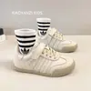 Zapatillas de entrenamiento alemanas para niños 2025 otoño nuevo estilo zapatillas de suela blanda para niños zapatillas deportivas zapatillas casuales transpirables para niñas