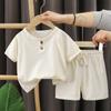 Traje de manga corta para niños verano nuevo pantalones cortos para niños coreano gofre para bebé verano ropa infantil al por mayor