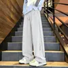 Marca de moda americana Pantalones de chándal grises de peso pesado con corte oblicuo para hombre y mujer Otoño Holgados Adelgazantes High Street Pierna recta Deportivos Casuales Pantalones largos