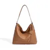 Bolso de hombro de alta gama nuevo 2026, moderno y único, hecho de cuero genuino de plena flor, un bolso de axila de gran capacidad adecuado para el trabajo y el uso diario