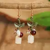 Pendientes de Venta Caliente Transfronterizos en Varios Estilos de Europa y América, Pendientes de Diseño Exagerado de Gama Alta de Círculo Metálico con Forma de Flor en Stock