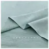 Tejido de algodón 100% ultra suave, 32/40S, de doble hilo, tejido liso, peinado, perchado por una cara, para camisetas de marca de moda y camisetas básicas