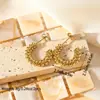 Brincos Redondos Torcidos de Aço Inoxidável Estilo Retrô Europeu e Americano Celebridade da Internet Brincos Geométricos em Forma de U com Padrão de Cânhamo Dourado 18k Brincos Femininos