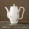 Tetera de Porcelana Blanca Cerámica Mariposa Blanca Pintada a Mano Traje Tetera para el Hogar Fabricante de Té con Filtro Tetera Venta al por Mayor