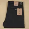 Pantalones de hombre de poliéster grueso elástico para otoño e invierno, cintura recta, pantalones casuales de negocios de lyocell para hombre