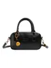 Otoño 2025 Nuevo Color Sólido Exquisita Moda Portátil Hombro Bolso Casual Bolso Mensajero de Moda de Nueva Textura para Mujer