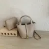 Bolso de Mujer 2026 Nuevo Casual para el Trabajo Bolso de Mano de Moda Versátil Bolso de Hombro Único Cruzado Bolso Cubo de Textura de Nicho