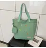 Bolsa de Lona de Gran Capacidad para Mujer 2025 Verano e Otoño Nueva Bolsa de Hombro Tipo Tote para Mujer Estudiantes Universitarios Asistiendo a Clase Hombro Único