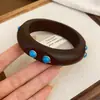 Pulsera Redonda de Perlas Facetadas de Madera Estilo Étnico Retro Pulsera de Diseño de Nicho Versátil para el Trabajo Joyería para la Mano Venta al por Mayor