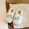 Zapatos de felpa con orejas de conejo para niños, nuevo estilo de invierno 2026, zapatos de algodón para bebé tipo princesa de color liso, calzado cálido