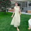 Moda Casual de Verano 2026 Simple y Elegante Estilo Francés de un Solo Botón Sin Mangas Plisado Acampanado Vestido Tendencia