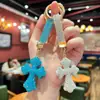 Llavero de cruz con incrustaciones de diamantes de arcilla blanda transfronterizo de Amazon, diseño lindo para bolsos y colgantes de llaves de coche