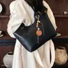 Bolso Tote simple estilo nuevo versátil otoño bolsa de gran capacidad para mujeres 2026 bolso de hombro para ir al trabajo moderno casual