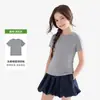 Camiseta de verano de manga corta y cuello redondo para mujer y niños, con corte regular, alta elasticidad, tacto cómodo y un diseño relajado y sin restricciones. Un top básico de color liso