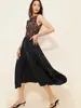 Falda midi de lunares elástica en la cintura y bajo irregular, superventas transfronterizo europeo y americano, estilo vacacional, favorecedora de la figura