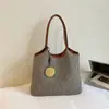 Bolsa Versátil Casual de Verano para Vacaciones Transfronteriza 2026 Tejida para Viajes Diarios Moda Simple Bolso de Hombro o Axila Tote