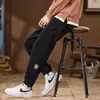 Nuevos Pantalones de Pana Sueltos de Moda para Hombre Otoño 2024 Pantalones Deportivos de Moda Tendencia Pantalones Casuales Simples Atmosféricos