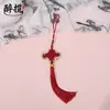 Novos pompons de miçangas estilo chinês com acabamento dourado, apresentando um design de nó chinês tradicional, disponíveis para atacado como pingentes e acessórios para vestuário finished