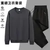 Conjunto deportivo casual de sudadera para hombre, nueva moda versátil de primavera y otoño, sudadera transpirable de cuello redondo, conjunto deportivo de dos piezas