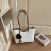 Nova bolsa tote estilo coreano com estampa de leopardo para o início do outono de 2026, bolsa de ombro de grande capacidade para trabalho e deslocamento, bolsa de mão simples e única