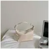 Bolsas Xiaomi Mi estilosas de nicho para mulheres 2026 outono novo modelo bolsa transversal de crochê da moda bolsa de mão elegante estilo coreano bolsa bolinho