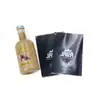 Etiquetas termorretráctiles personalizadas para bebidas de frutas, película termorretráctil para botellas, película de etiqueta impresa a color para artículos de tocador, directo de fábrica