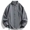 Camisa de manga comprida solta de cor sólida para primavera e outono para homens, estilo simples de roupa de trabalho, camisa casual versátil, modeladora e estilosa, design moderno