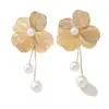 Pendientes de flor de ginkgo tridimensionales versátiles de moda transfronteriza europea y americana, tachuelas de pétalos de hilo de oro geométricas exageradas únicas