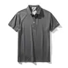 Nova Camisa Polo de Manga Curta Primavera e Verão 2026 Masculina Business Casual Gola Lapela Camiseta Solta Cor Sólida Top Camiseta