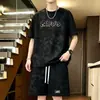 Camiseta de manga corta tie-dye con vibra americana para hombre, nueva marca de moda de verano, estilo desgastado, conjunto de dos piezas de moda juvenil