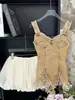 Traje de Dos Piezas Estilo Desolación de Gama Alta, Camisola de Mezclilla Ajustada con Borlas Retro, Falda Voluminosa Flor de Capullo