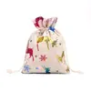 Los regalos impresos con dorados puntuales se pueden llenar con la bolsa de Navidad de manzana, algodón lino para bolsa de dulces navideños en Nochebuena