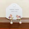 Lindos Aretes de Caballo de Madera con Perlas de Agua Dulce de Dibujos Animados con Aguja de Plata, Elegantes y Sofisticados Aretes de Nicho para Mujer