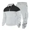 Conjunto de sudadera con cremallera y cuello alto y pantalón de chándal de trabajo para hombre, de estilo europeo y americano, para otoño e invierno, exterior, sencillo, con bloques de color y corte holgado