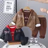 Conjunto de Abrigo de Algodón con Capucha para Otoño e Invierno Infantil 2025 Nuevo Estilo Niños y Niñas Bebé Engrosado Conjunto de Tres Piezas de Invierno Venta al por Mayor