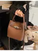 Bolso Cubo Simple y Elegante para Mujer 2026 Nuevo Bolso de Hombro Retro de Nicho Bolso Cruzado Casual para el Día a Día