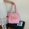 Bolso Tote Versátil de Moda para Viajes Diarios para Mujer 2026 Primavera Nuevo Nicho Gran Capacidad Estampado de Letras con Cordón Bolso de Hombro
