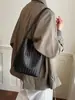 Bolso de mano tejido con patrón retro transfronterizo para mujer, nuevo y elegante bolso de mano de alto valor para el día a día, moderno bolso de hombro único para madre e hija