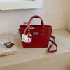 Bolso de Cuero en Relieve Vintage de Gama Alta para Mujer 2026 Nueva Moda Bolso Cruzado Versátil Bolso de Mano Súper Popular Bolso Tipo Cubo