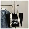 Bolso de lona con estampado de letras grandes estilo coreano, nuevo y moderno 2025, bolso de mano casual texturizado para el día a día