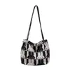 La bolsa popular de este año 2023 nueva moda en línea popular bolsa tote para mujer gran capacidad Bolso de hombro de lona para mujer