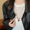 Collar de cuentas con forma de corazón atmosférico para mujer, Nueva cadena para suéter estilo chino, Cadena para el cuello de diseño de nicho 2025