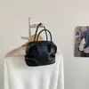2026 Estilo Coreano Nicho Simple Bolso Tote tipo concha para el día a día Moda Transfronteriza Sensación de Alta Gama Bolso de Hombro para Mujer