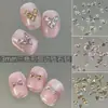 Acessório de strass para nail art em zircônia chanfrada 5A triangular, popular online, strass para unha mini de fundo chato 3mm com design de laço