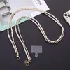 Estilo perfumado pequeno transfronteiriço Pérola Celular Pescoço Pendurado Corda Internet Popular Couro Vestindo Corrente de Celular Crossbody Cadeia Acessórios para Mulheres