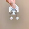 Pendientes elegantes de cisne con perlas y diamantes estilo francés, sensación de lujo ligero y alta gama, diseño moderno y exquisito, pendientes versátiles
