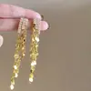 Pendientes Dorados Largos con Borlas para Niñas 2025 Nuevo Estilo Lujo Accesible Pendientes de Gama Alta con Pequeños Pendientes Elegantes y Elegantes