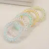 Diadema de línea telefónica de puntos transparentes Cuerda para el pelo gruesa de alta elasticidad con lunares Atadura para coleta Bola en la cabeza Accesorios para el cabello Amazon