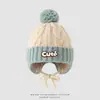 Gorro de invierno para niños, gorro de punto con etiqueta SMILE, protección para las orejas, pompón, gorro de punto cálido, gorro tipo pullover a prueba de viento para niños de mediana edad
