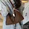 Bolso de gamuza para mujer, gran capacidad, nuevo 2025, vintage, versátil, de hombro, para llevar debajo del brazo, bolso tote para estudiantes universitarias, para clases